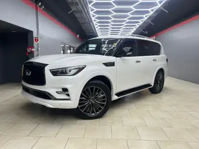 Experience luxury and power with the stunning 2024 INFINITI QX80 LUXE, presented in a sophisticated...