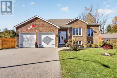 Exceptional all-brick raised bungalow boasts 5 spacious bedrooms and 3 full baths. Prime location di...