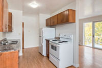 Amenities: Updated Appliances • Heat & Water Included • Storage Room Suite & Building: Bachelor, one... (image 4)