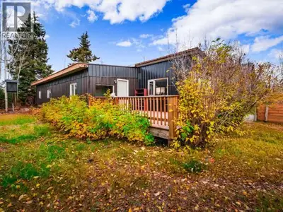 Affordable three bedroom home with detached and partially finished 21x29 shop/garage, all on a lovel...