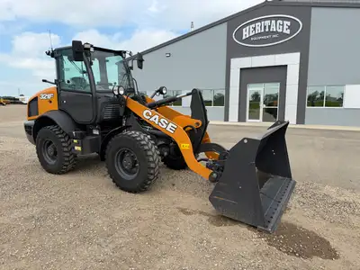 130 hours, 365/80R20 tires, deluxe cab, air seat, ride control, Skidsteer coupler, aux hyds, 1.7 yd...