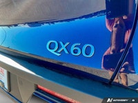 This INFINITI QX60 has a powerful Premium Unleaded V-6 3.5 L/213 engine powering this Automatic tran... (image 9)