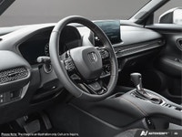 Get behind the wheel of the vibrant red 2027 Honda HR-V Sport AWD, engineered for all-weather condit... (image 8)