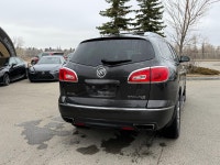The 2013 Buick Enclave Premium AWD is a full-size luxury crossover that underwent a significant refr... (image 2)