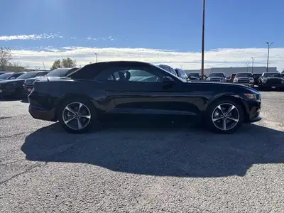 Trade In Vehicle**Ford**Mustang**V6**3.7L**Automatic**Convertible**Back Up Camera**Bluetooth**Paddle...