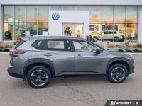 Panoramic views and all-weather capability define this exceptional 2024 Nissan Rogue SV Moonroof. Th... (image 5)
