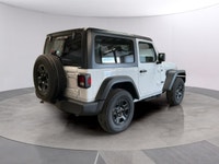 Presenting the 2026 Jeep Wrangler Sport in a classic white finish, this Sport 2 Door 4x4 stands out... (image 4)