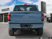 This stunning 2023 Ford F-150 Lightning XLT boasts a powerful dual-motor all-wheel-drive system and... (image 4)