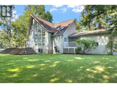 A truly special acreage perched at the top of Dragon Hill! Set on 2.24 private acres across TWO TITL...