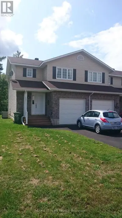Charming 3 bedroom 1.5 bathroom modern townhouse in Central Petawawa. Open concept layout on the mai...