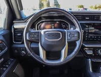 The 2023 GMC Sierra 1500 Denali Crew Cab Short Box 4-Wheel Drive is a powerhouse of capability wrapp... (image 8)