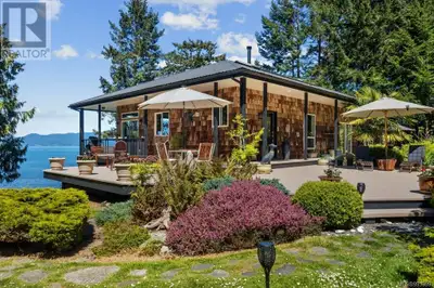 Welcome to a slice of serenity nestled in a remarkable 3+ acre waterfront property. This immaculate...