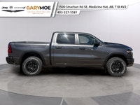 The 2026 Ram 1500 Rebel is the epitome of rugged sophistication. This Gray beauty, equipped with 44... (image 1)