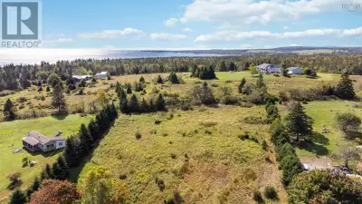 Dreaming of a custom-built home with panoramic ocean views? This elevated 0.85-acre lot with vista o...