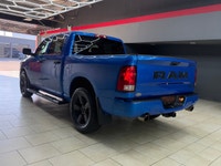 The 2021 Ram 1500 Classic Express 4x4 Crew Cab in a striking Blue finish is a true powerhouse with i... (image 7)