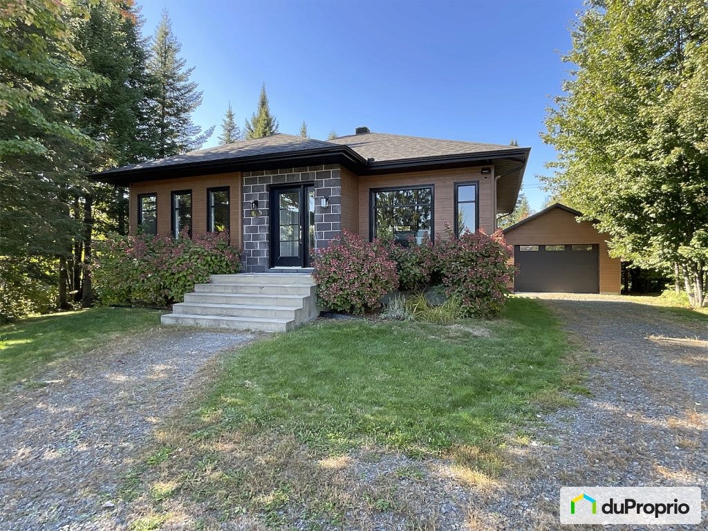 $590,000 - Bungalow for sale in St-Boniface — photo 1