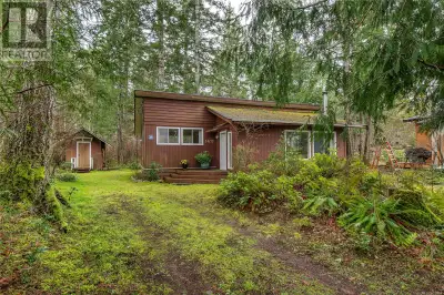 Nestled in a picturesque setting just steps from the beach, this charming one-bedroom cabin offers t...