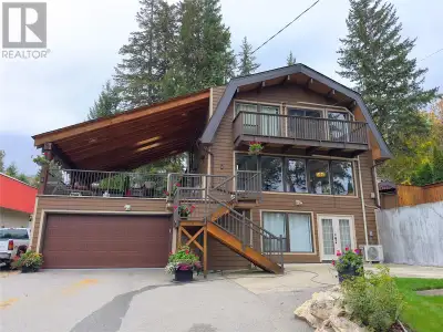 Beautiful updated home with Stunning Lake Views! This 3,270 SqFt home in Blind Bay, BC offers breath...