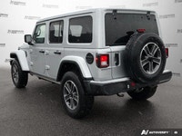This Jeep Wrangler has a powerful Gas/Electric V-6 3.6 L/220 engine powering this Automatic transmis... (image 2)