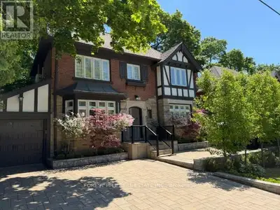 **Discover the charm of 607 Spadina Road, this elegant Forest Hill Tudor, and classic curb appeal re...