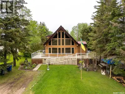 This one of a kind Jasper ski chalet inspired home sits on an expansive six lot property and feature...