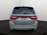 Experience the ultimate fusion of muscle-car attitude and three-row utility in this aggressive SUV,... (image 4)
