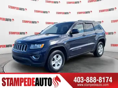 This outstanding example of a 2015 Jeep Grand Cherokee Laredo is offered by Stampede Auto. The Jeep...