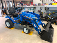 New Holland Tractor and loader , 25s