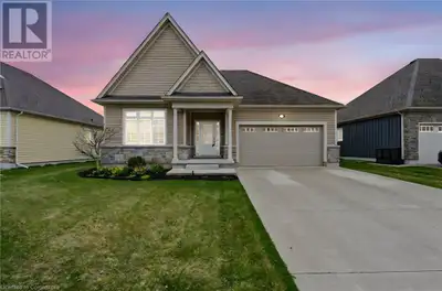 Welcome to this stunning custom bungalow nestled in the peaceful community of Ridgeway. Just minutes...