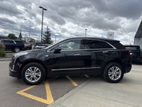 AMVIC Licensed Dealer This 2025 Cadillac XT5 Luxury arrives in a classic Stellar Black Metallic exte... (image 4)