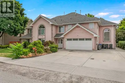 This cash flow rental property boasts an enviable location just steps away from the beach & Kelowna...
