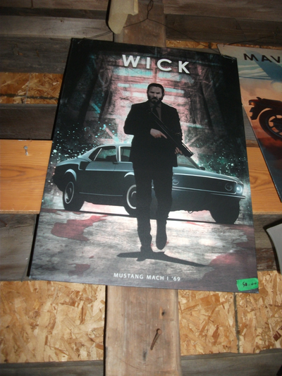 Metal movie posters from popular movies, 27" by 19" 50.00 ea. at Porkie's Antique Emporium 1540 hwy...