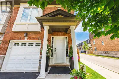 Welcome to 2220 Queensway Drive # 4. This exceptional end-unit townhome is sure to impress! Boasting...