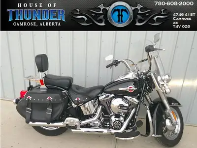 Ride in legendary style with this 2016 Harley-Davidson Heritage Softail Classic, a perfect blend of...