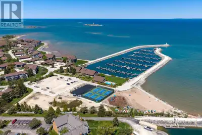 xperience the best of waterfront living at Lighthouse Point Yacht & Tennis Club -a highly sought-aft...