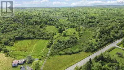 Welcome to 6782 Highway 215 a rare and expansive 198-acre parcel nestled in the heart of Nova Scotia...