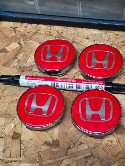 Im loooking to sell my 11th gen honda civic si/type r red rim center caps $25.00 Also selling a bran...
