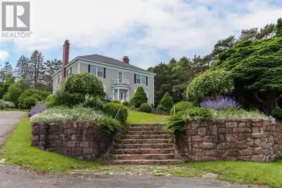 Situated atop a gently sloping riverview lot with sweeping views of the Kennebecasis and next door t...