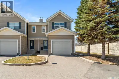 This townhouse style condo has been well cared for, and it shows. The open concept main floor connec...