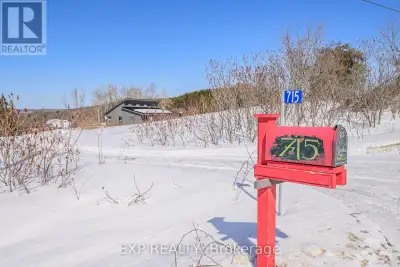 Welcome to this custom-built country bungalow, set on an approximately 2.38-acre parcel in Centre Ha...