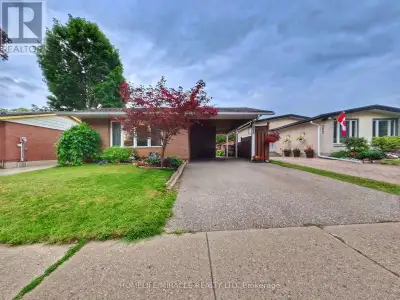 Turnkey bungalow versatility in desirable East Waterloo. Situated on a quiet crescent in the establi...