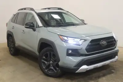 Experience the rugged elegance of the 2022 Toyota RAV4 Trail, presented in a sophisticated Gray fini...