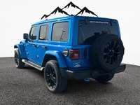 THIS WRANGLER SAHARA UNLIMITED COMES WITH THE 2.0L DOHC PHEV ENGINE, PREMIUM MCKINLEY HEATED LEATHER... (image 2)