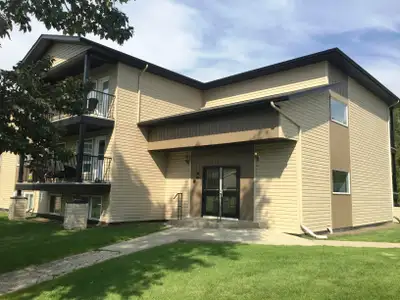 Tucked away on a peaceful, tree-lined close off Taylor Drive, this spacious main-floor retreat offer...