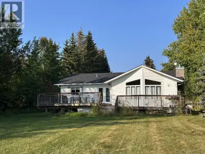 Lakefront Opportunity at Blais Resort. Embrace the potential of this charming lakefront property loc...