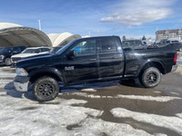 Calling all enthusiasts for this stunning and agile 2014 Ram 1500 ST. Take pleasure in the quick shi... (image 1)