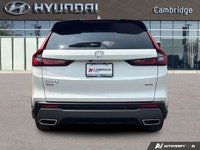 The 2026 Honda CR-V Hybrid Touring isn't just an SUV; it's your efficient and sophisticated partner... (image 3)