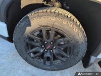 Experience the power and versatility of the 2026 GMC Sierra 1500 Elevation, a new white Crew Cab Sho... (image 6)