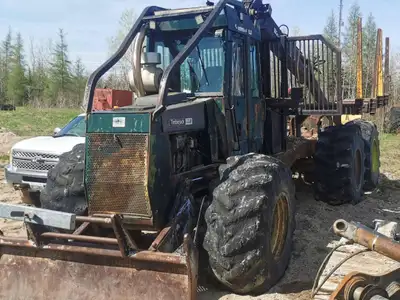Timberjack 520B Forwarder, exact year unknown, 6x6, Cummins engine, front blade, Granab loader with...