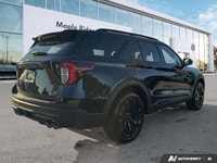 Experience exhilarating performance and sophisticated style in this striking 2024 Ford Explorer ST.... (image 4)